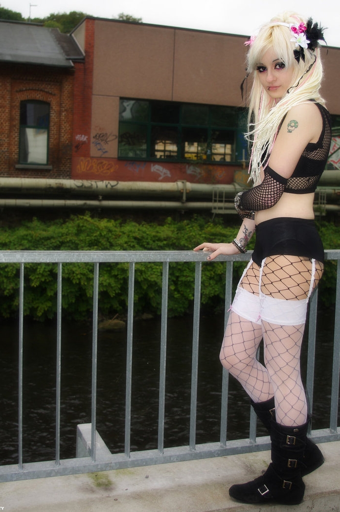 Blonde Gothic Girl wearing Purple Fishnet Stockings on Black Fishnet Pantyhose